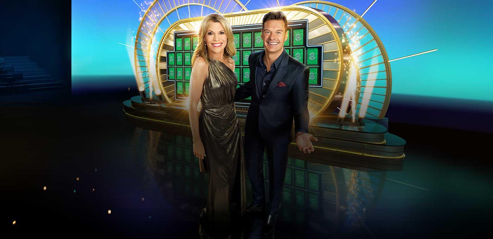 Ryan Seacrest and Vanna White on the set of Wheel of Fortune